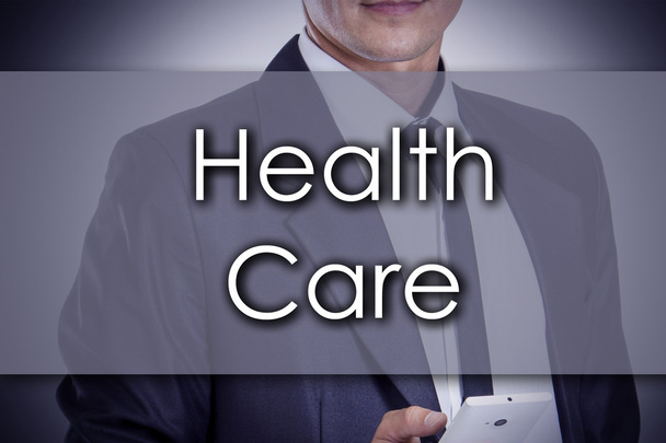 Health Care - Young businessman with text - business concept - Photo, Image