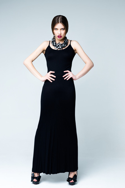woman wearing black dress   - Foto, Bild