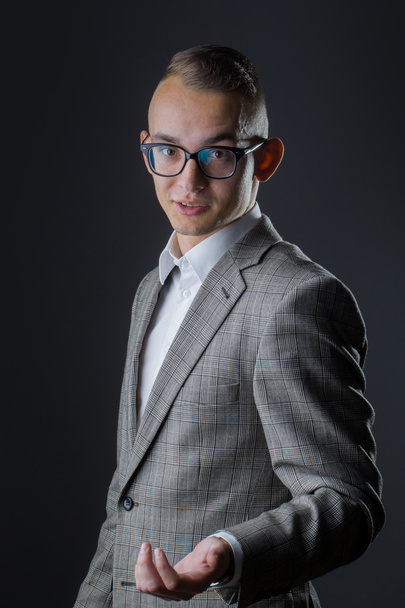 Young stylish guy in glasses talking - Fotografie, Obrázek