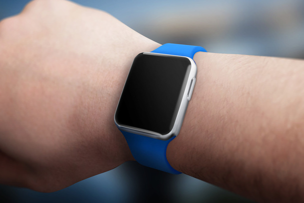 Smart watch on hand with blank screen for mockup. - Photo, Image