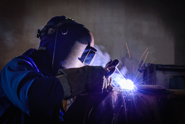 Welding steel structures and bright sparks - Photo, Image