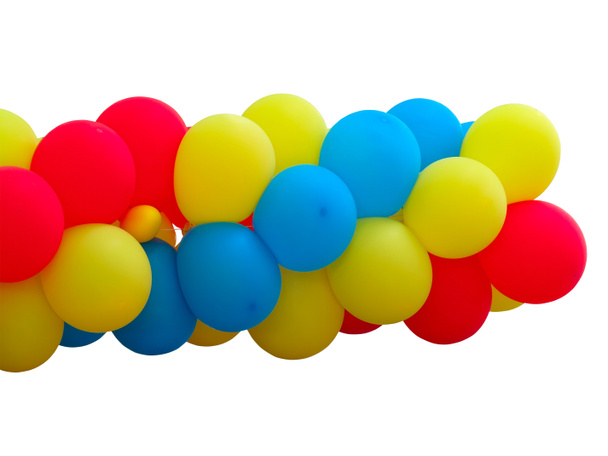 Un mucchio di palloncini rossi, blu e gialli isolati su bianco
 - Foto, immagini