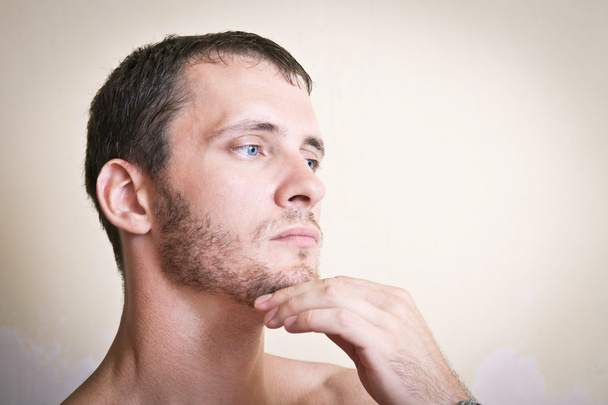Portrait of thoughtful attractive man close up - Photo, Image