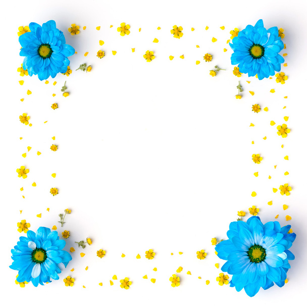 blue flowers pattern on white background. Flat lay. - Foto, imagen