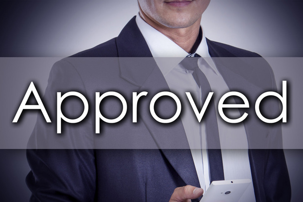 Approved - Young businessman with text - business concept - Photo, Image