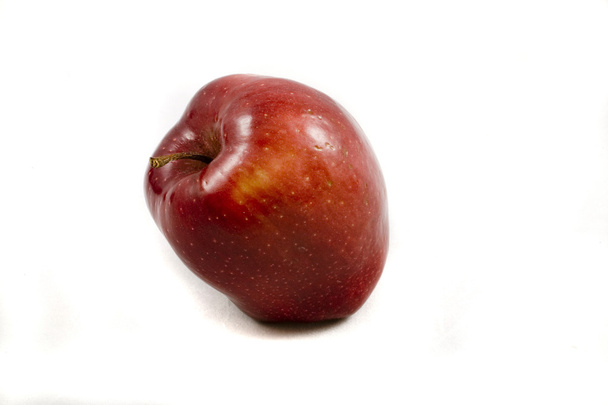 herfst rode appel eten op witte achtergrond - Foto, afbeelding