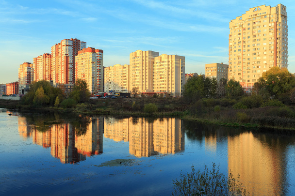 New residential district on the bank of the river Pekhorka during sunset. Balashikha, Moscow region, Russia - Zdjęcie, obraz
