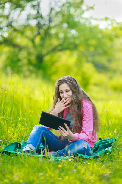 Girl with tablet computer - Foto, Bild