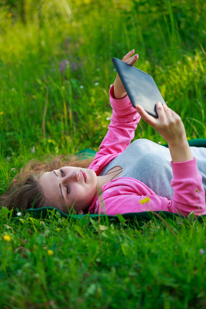 Girl with tablet computer - Фото, зображення