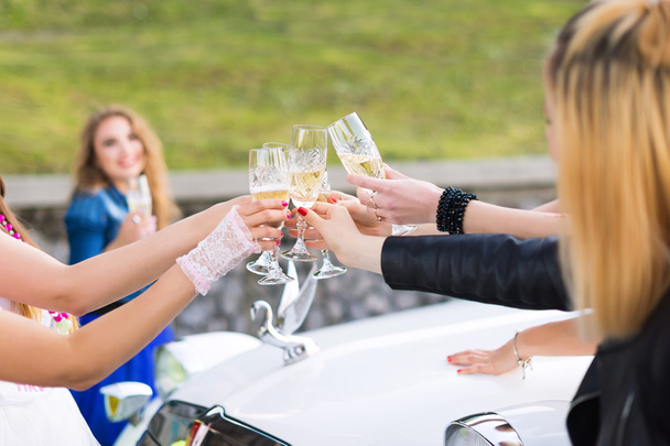 Closeup photo of girls celebrating a bachelorette party with bride - Photo, Image