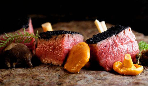  Delicious medium beef steaks with mushrooms - Photo, Image