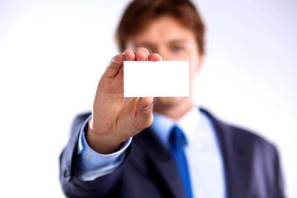 creative businessman holding out his business card - Photo, Image