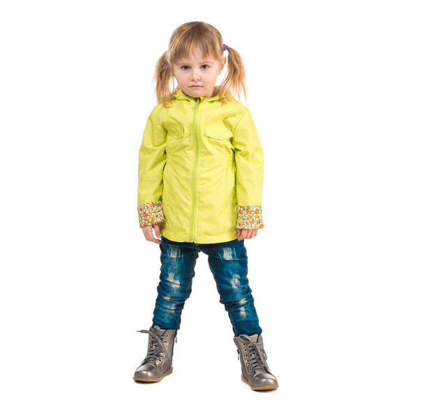 serious little girl in yellow coat - Φωτογραφία, εικόνα