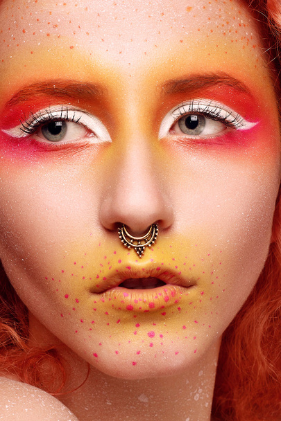 Beautiful Woman with Red Hair and bright makeup - 写真・画像