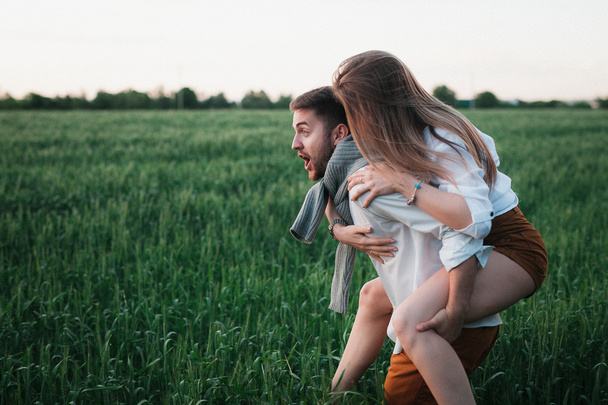 young couple in love posing on nature - Foto, immagini