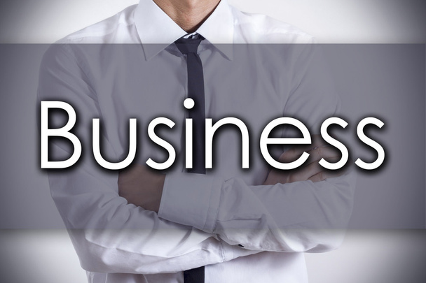 Бизнес - Молодой бизнесмен с текстовой - бизнес-концепцией
 - Фото, изображение