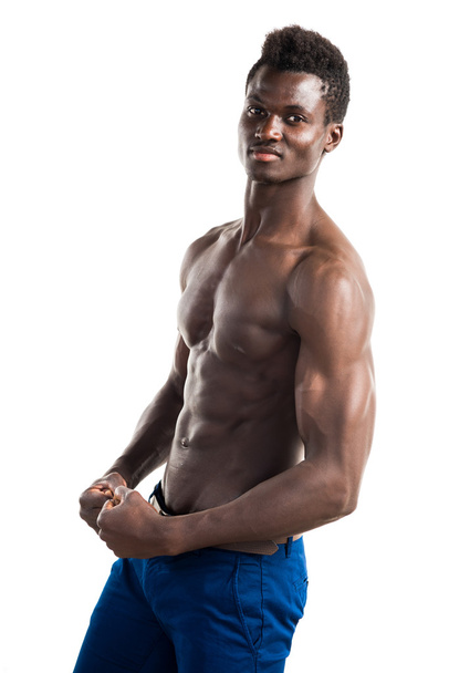 スポーツマン体型のポーズとハンサムな黒人男性 - 写真・画像