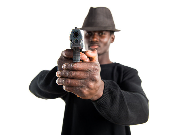 Black man holding a pistol - Photo, Image