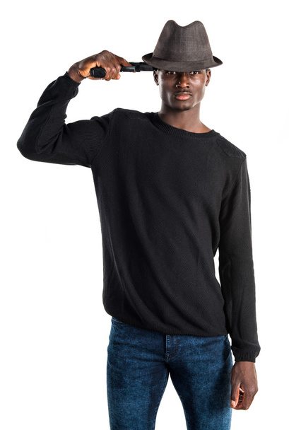 Μαύρο άνθρωπος που κρατά ένα πιστόλι - Φωτογραφία, εικόνα