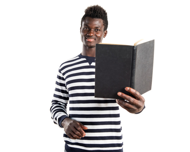 Handsome black man reading book - Foto, Imagem