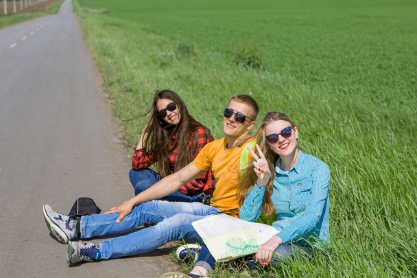 Young hipster friends travel on road - Фото, изображение