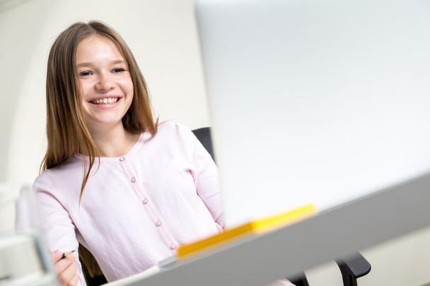 Smiling woman using laptop closeup - 写真・画像
