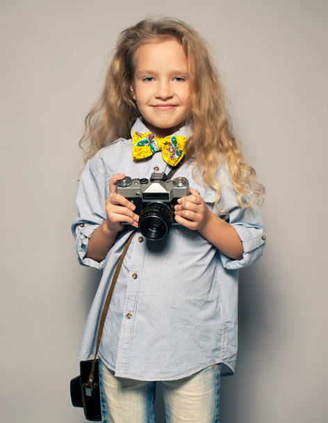 Child with camera. - Фото, изображение