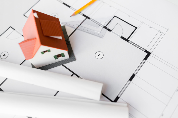 close up of house model on architectural blueprint - Foto, Bild
