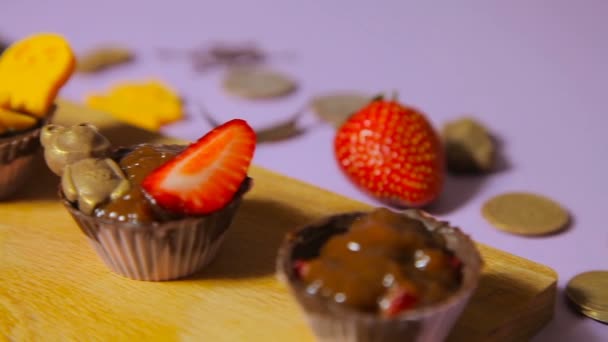 The decoration of chocolate tartlets - Footage, Video