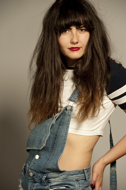 Gorgeous Young Brunette in Overalls - 写真・画像