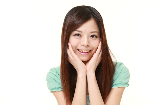 young Japanese woman smiles  - Foto, Imagem