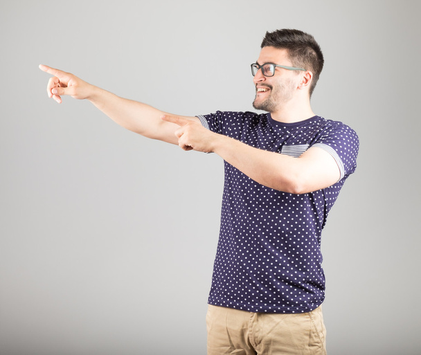 Man pointing towards something - Foto, Imagen