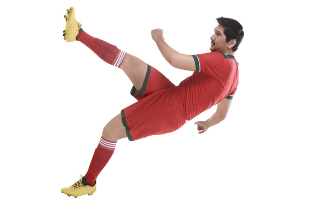 player high kicking  ball  - 写真・画像