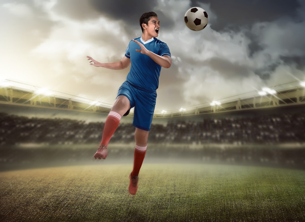 Soccer player headering  - Photo, image
