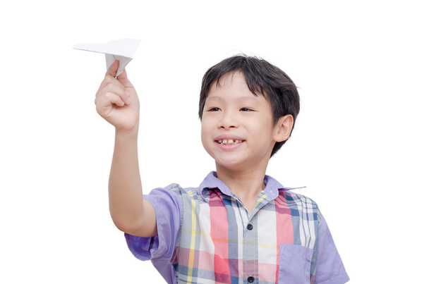 紙飛行機で遊ぶ少年は - 写真・画像