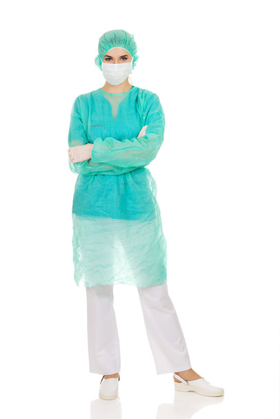 Female surgeon doctor in protective mask - Fotoğraf, Görsel