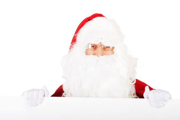 Photo of happy Santa Claus in eyeglasses - Photo, image