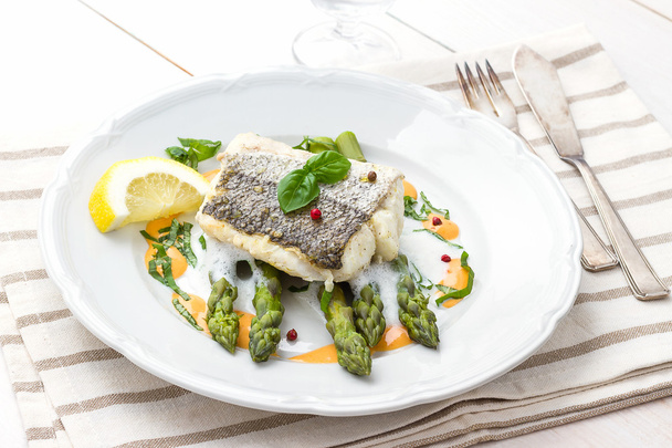 Hake fillet with asparagus foam sauce - Photo, Image