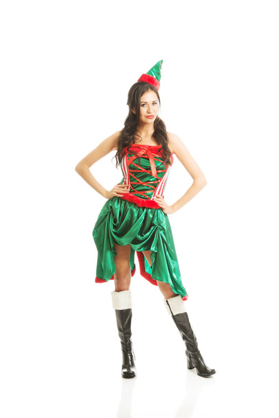Full length beautiful woman wearing elf clothes, touching her hips - Photo, image