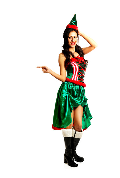Woman wearing elf clothes pointing right - Foto, immagini