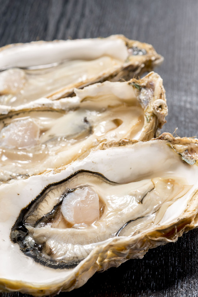 Raw oysters of seafood is very fresh and delicious food - Photo, Image