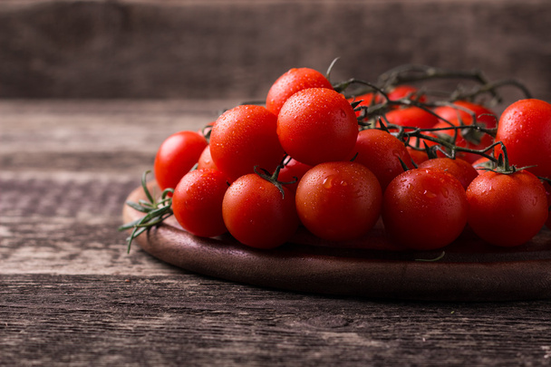 cherry tomatoes on wooden background - Fotoğraf, Görsel