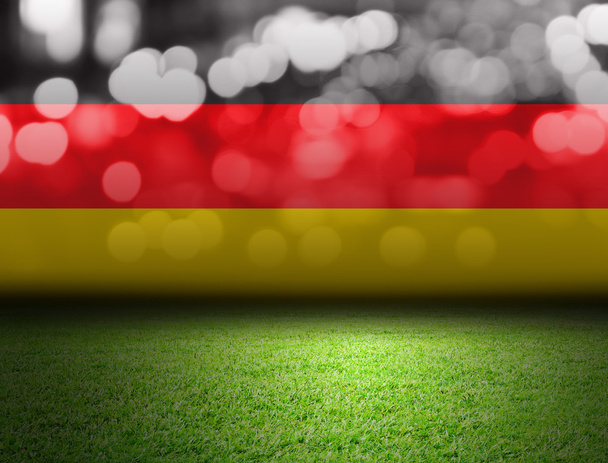Soccer field and bokeh with germany flag  - Photo, Image