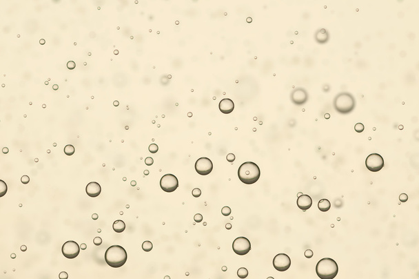 Burbujas de aire dorado
 - Foto, imagen