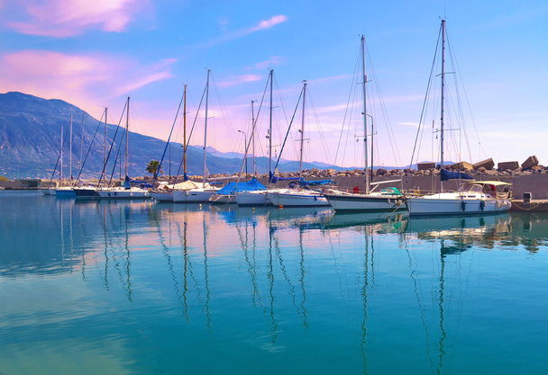 закат лодки отражение Пелопоннес Греция
 - Фото, изображение