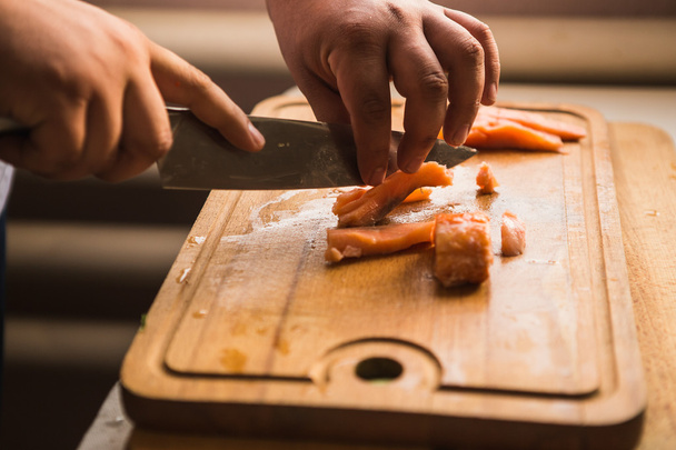 Chef cutting salmon  - Фото, зображення