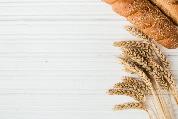 Ripe wheat and bread with copy space - Photo, Image