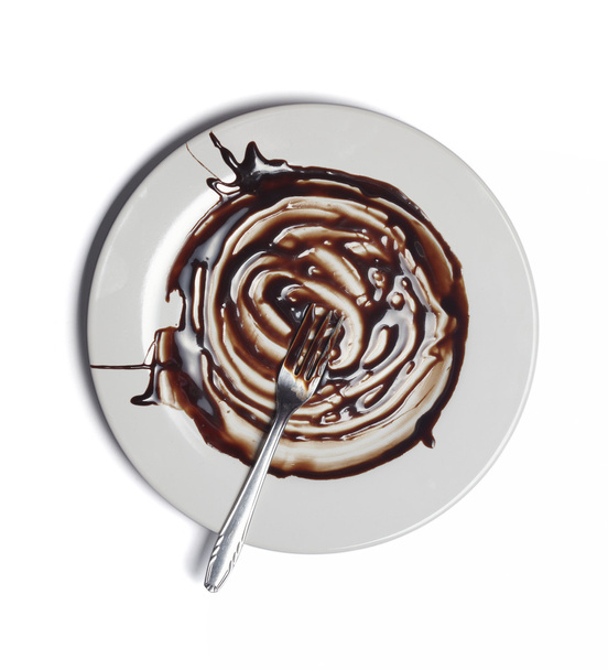 Sciroppo di cioccolato che perde salsa mangiato cibo dolce
 - Foto, immagini