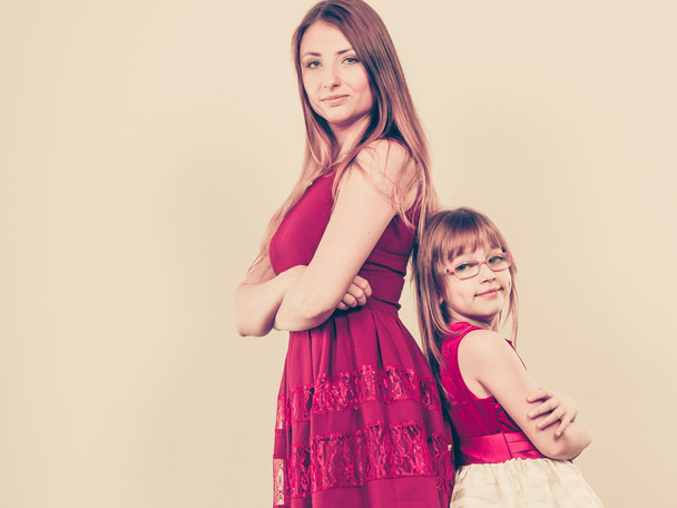Mother and daughter posing together - Foto, immagini