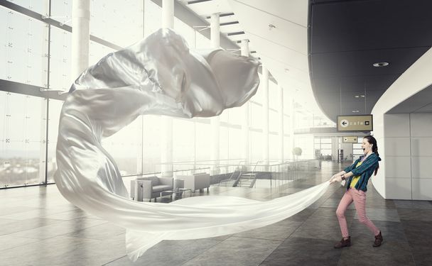 Woman pull white fabric - Foto, Bild